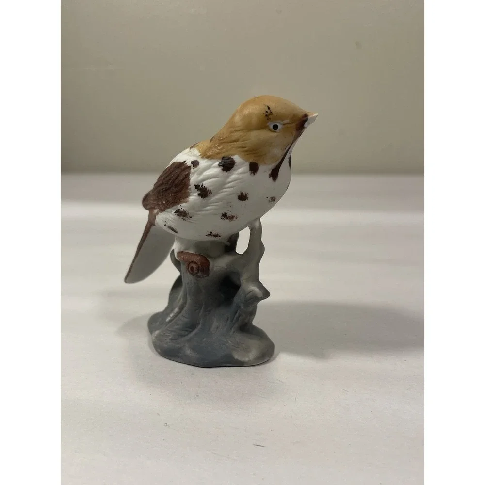 Bird by Juicy Couture small brown